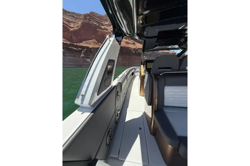 Slide: The Image of 2024 Cigarette 42' Auroris luxury boat interior with scenic canyon view. - 22