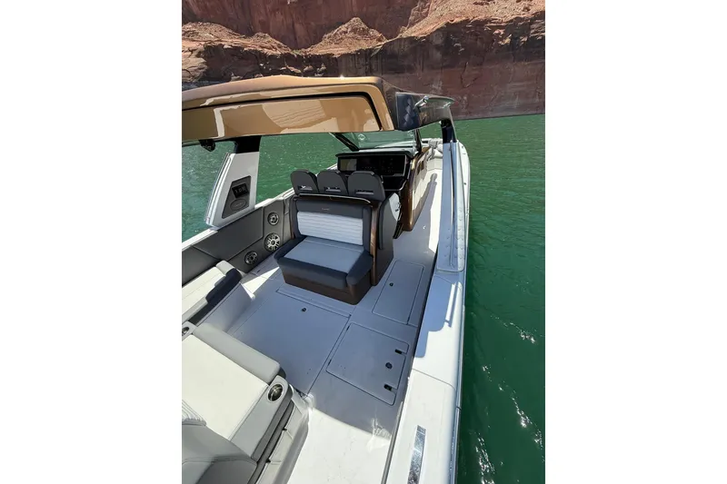 Slide: The Image of 2024 Cigarette 42' Auroris luxury boat interior on scenic waterway. - 27