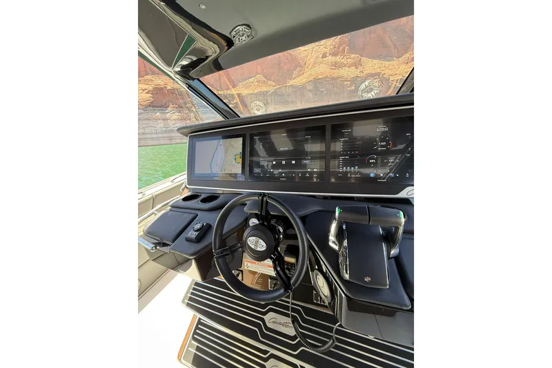 Slide: The Image of Cockpit of 2024 Cigarette 42' Auroris boat with advanced navigation displays. - 33