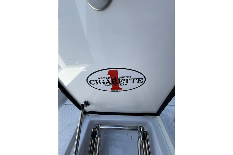 Slide: The Image of 2024 Cigarette 42' Auroris boat with World Champion Racing Team logo. - 53