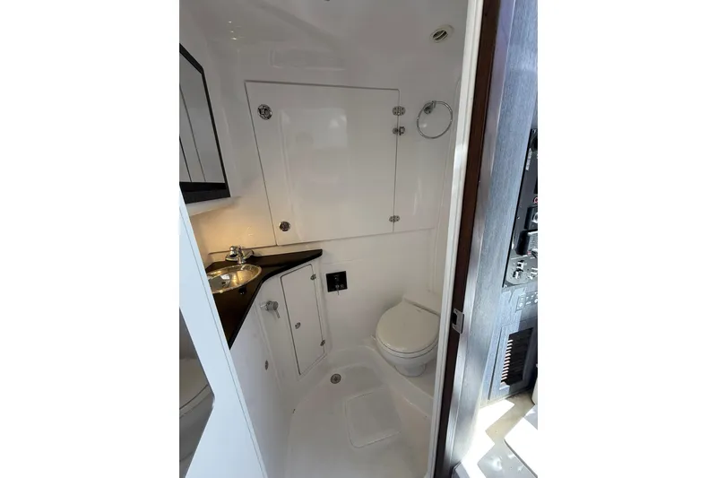 Slide: The Image of Luxurious bathroom in 2024 Cigarette 42' Auroris boat, featuring sleek design and modern amenities. - 62