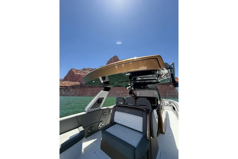 Slide: The Image of 2024 Cigarette 42' Auroris boat interior with scenic canyon backdrop. - 67