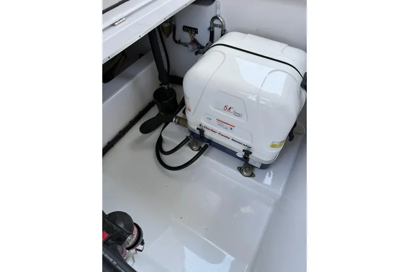 Slide: The Image of Engine compartment of 2024 Cigarette 42' Auroris with Fischer Panda generator. - 75