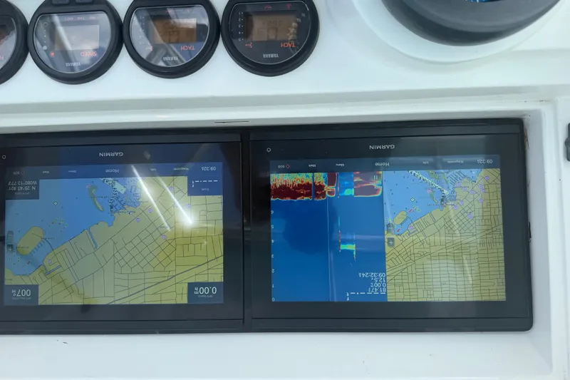 Slide: The Image of Navigation and sonar displays on a 2000 Contender 35 Side Console boat. - 13