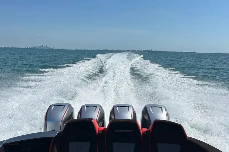 Slide: The Image of Powerful Concept 44' Open Deck boat cruising on open water, leaving a foamy wake. - 23