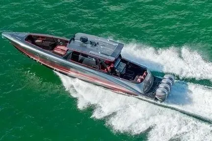 Slide: The Image of 2021 Concept 44' Open Deck boat cruising on vibrant green water. - 47