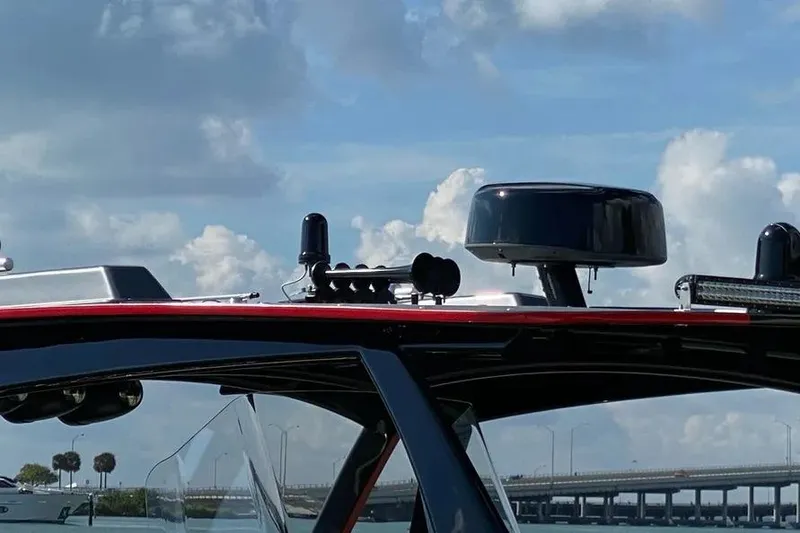 Slide: The Image of 2021 Concept 44' Open Deck boat with radar equipment against a cloudy sky. - 5