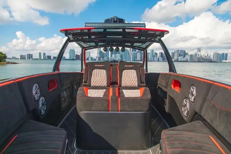 Slide: The Image of Luxurious 2021 Concept 44' Open Deck boat interior with city skyline backdrop. - 62
