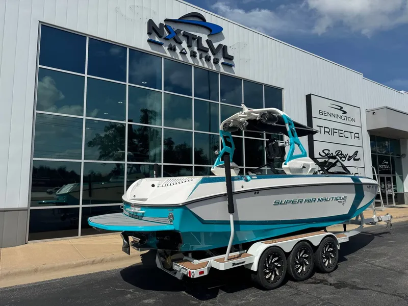 Slide: The Image of 2019 Nautique G25 boat outside NXT LVL Marine building. - 3