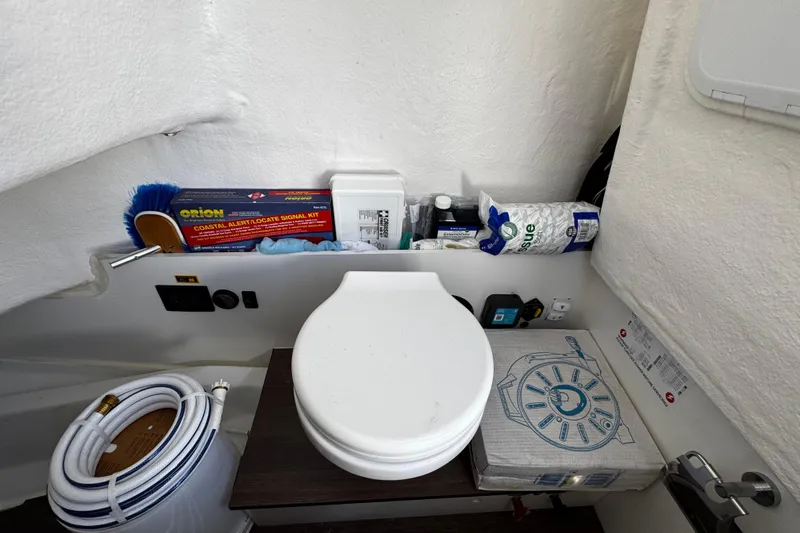 Slide: The Image of 2024 Beneteau Flyer 8 SPACEdeck interior storage with marine supplies and equipment. - 12