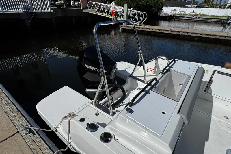 Slide: The Image of 2024 Beneteau Flyer 8 SPACEdeck with Mercury engine docked at marina. - 2