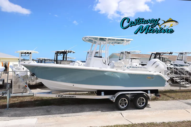 The Image of 2026 Sea Hunt Ultra 219 boat on trailer at Castaway Marine dealership. - 0