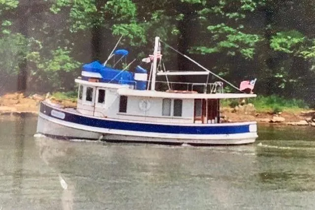 The Image of 1986 Gozzard Pilgrim 40 cruising on a calm river. - 0