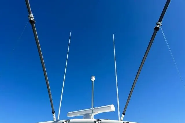 Slide: The Image of 2015 Regulator 34 boat antennas against clear blue sky. - 29