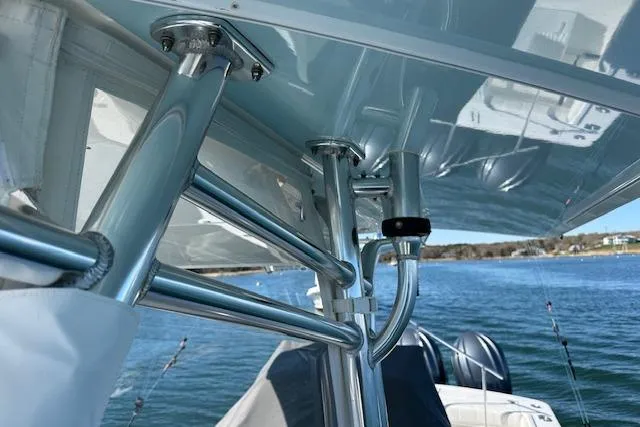 Slide: The Image of 2015 Regulator 34 boat with stainless steel railings and ocean view. - 35