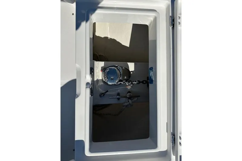 Slide: The Image of Anchor compartment of 2015 Regulator 34 boat with chain and winch. - 40