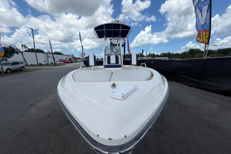 Slide: The Image of 2006 ShearWater 2200Z boat on display under a cloudy sky. - 10