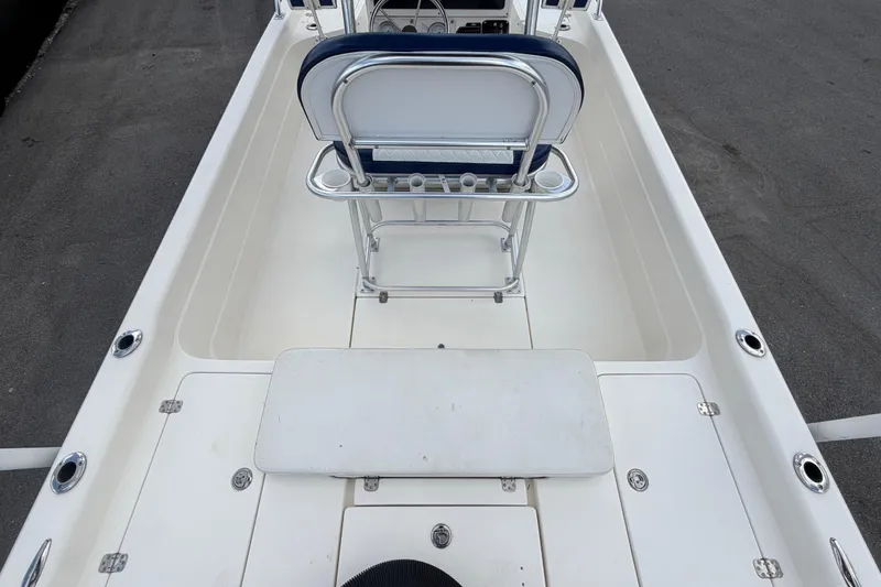 Slide: The Image of 2006 ShearWater 2200Z boat interior with seating and rod holders. - 15