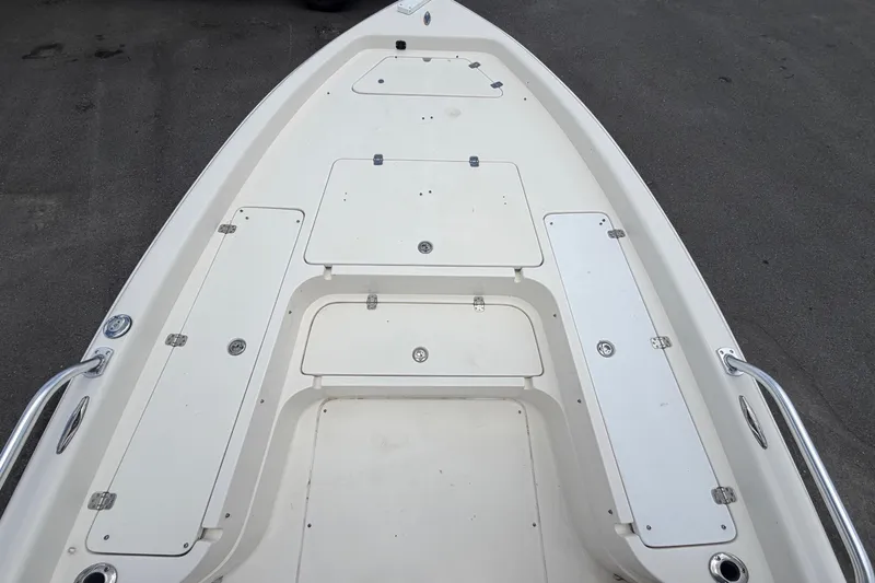 Slide: The Image of 2006 ShearWater 2200Z boat deck with storage hatches. - 36