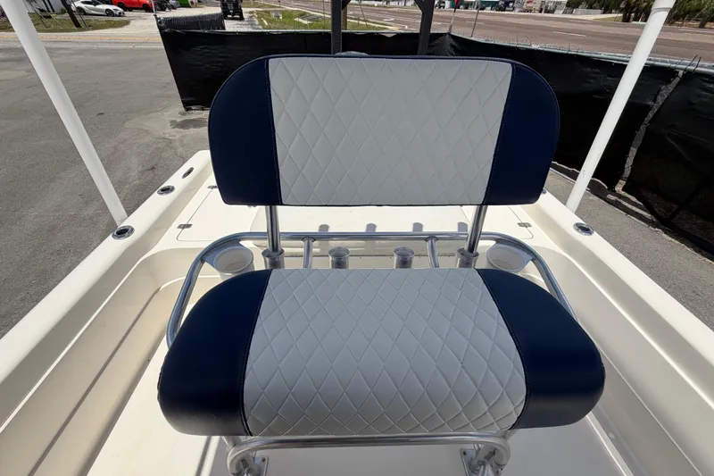 Slide: The Image of 2006 ShearWater 2200Z boat seat with blue and white diamond-pattern upholstery. - 53