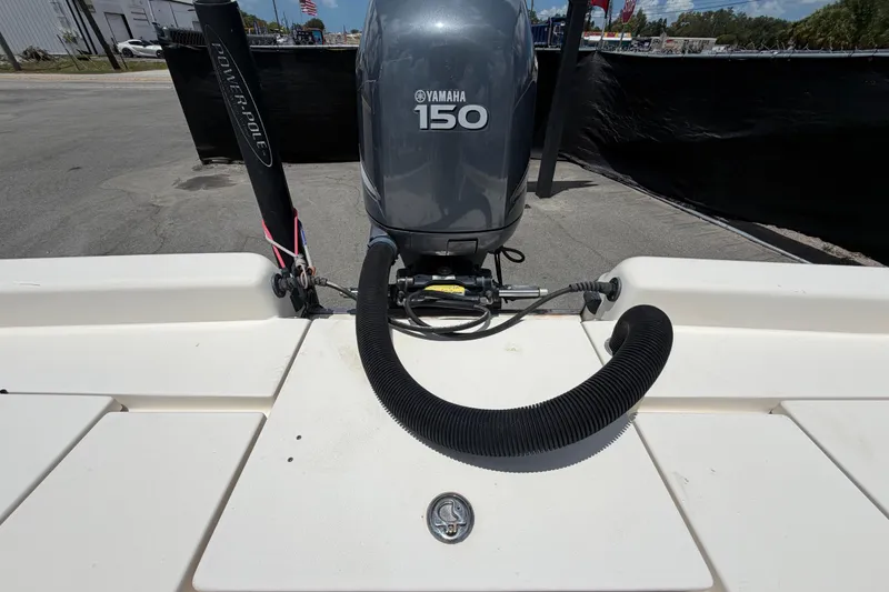 Slide: The Image of 2006 ShearWater 2200Z boat with Yamaha 150 outboard motor and Power-Pole anchors. - 59