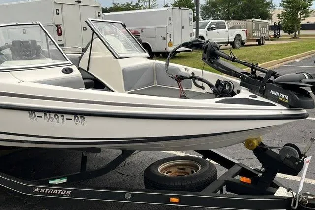 Slide: The Image of 2008 Stratos 476 Ski-N-Fish boat parked on trailer. - 4