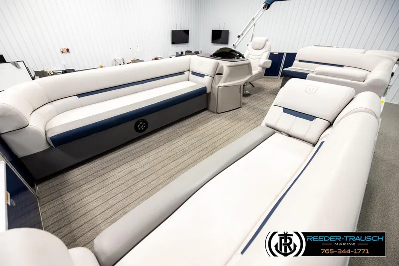 Slide: The Image of 2022 Godfrey Sweetwater 2286 pontoon boat interior with spacious seating and modern design. - 10