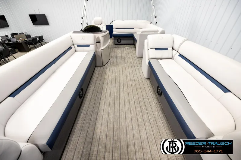 Slide: The Image of Interior of 2022 Godfrey Sweetwater 2286 pontoon boat with spacious seating and modern design. - 13