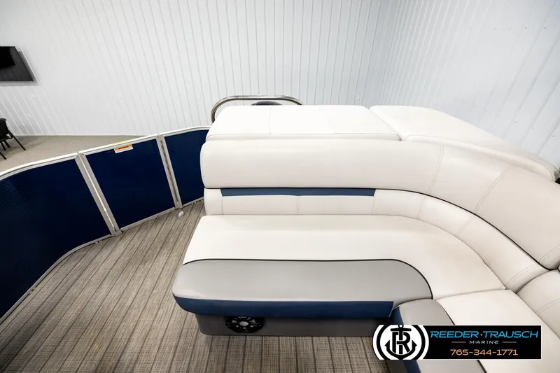 Slide: The Image of 2022 Godfrey Sweetwater 2286 pontoon boat interior with plush seating and modern design. - 15