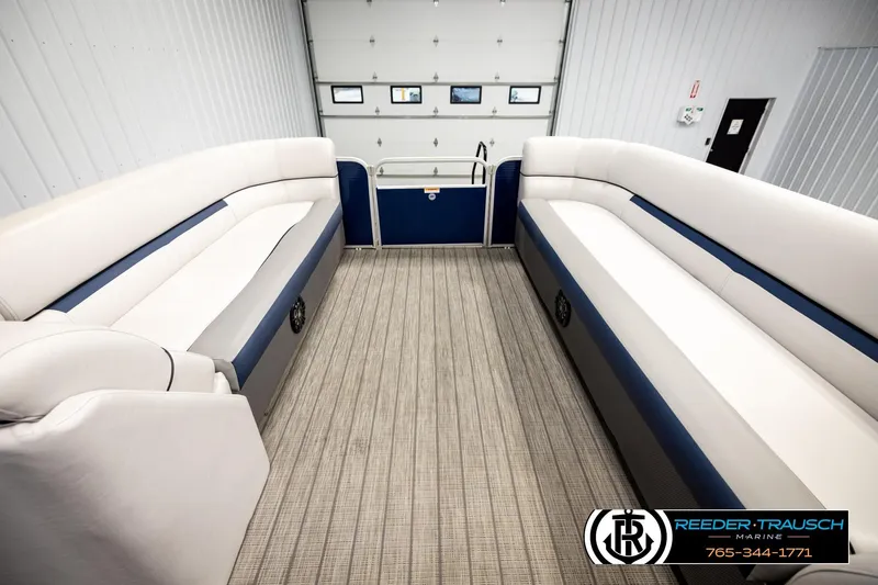 Slide: The Image of 2022 Godfrey Sweetwater 2286 pontoon boat interior with spacious seating and modern design. - 19