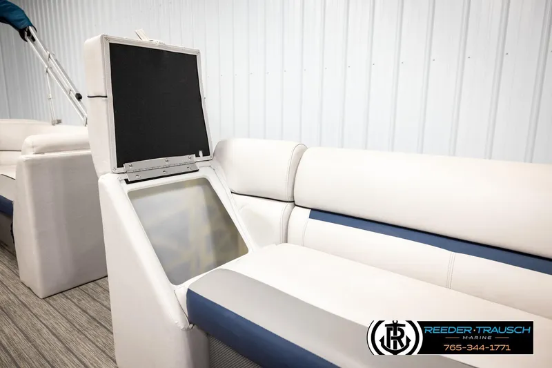 Slide: The Image of 2022 Godfrey Sweetwater 2286 boat interior with open storage compartment. - 27