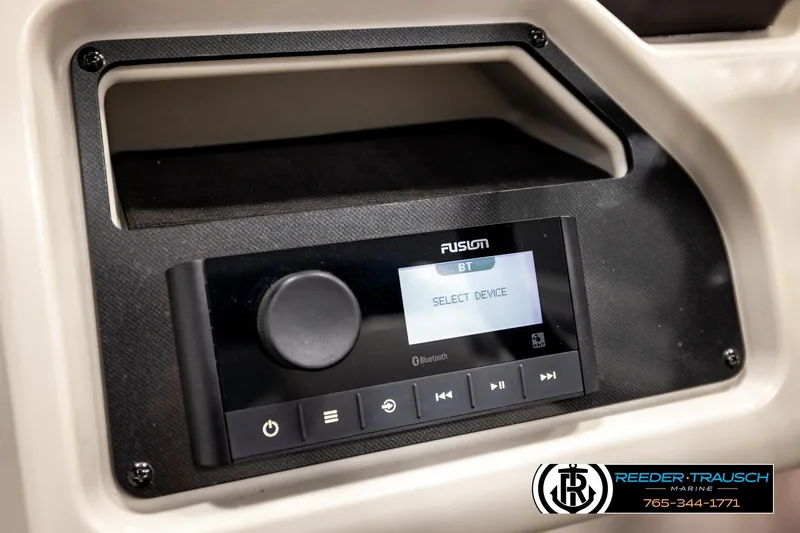 Slide: The Image of Fusion Bluetooth stereo system on 2022 Godfrey Sweetwater 2286 boat dashboard. - 31