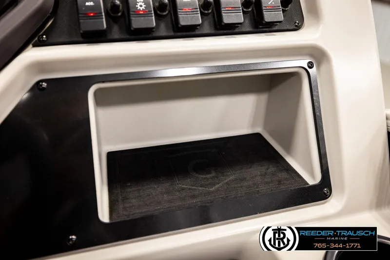 Slide: The Image of Control panel of 2022 Godfrey Sweetwater 2286 boat with storage compartment. - 36