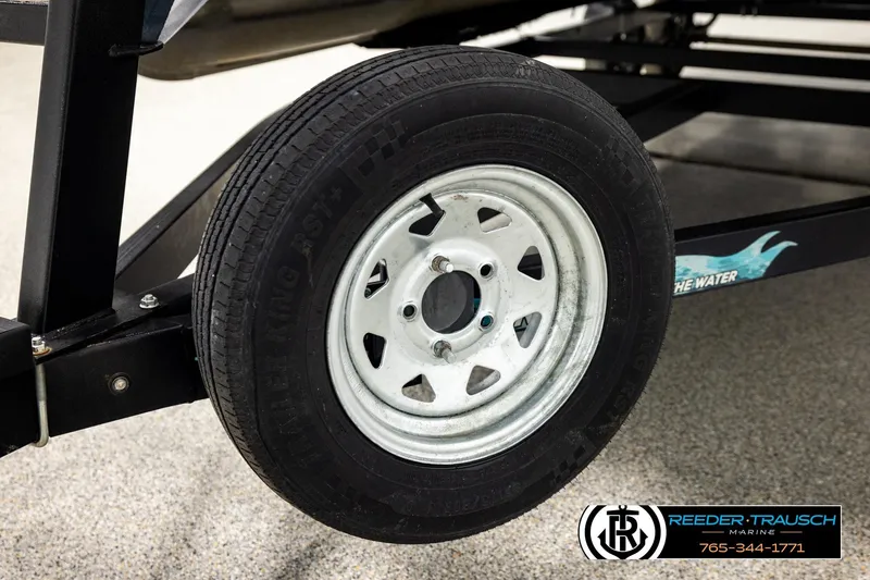 Slide: The Image of Trailer wheel of a 2022 Godfrey Sweetwater 2286, displayed at Reeder-Trausch Marine. - 47