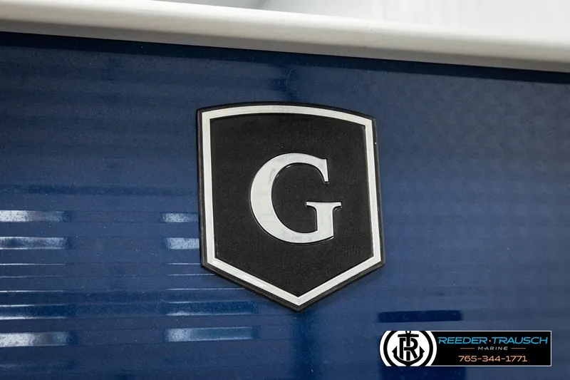 Slide: The Image of 2022 Godfrey Sweetwater 2286 boat emblem on blue background, Reeder-Trausch Marine logo visible. - 52