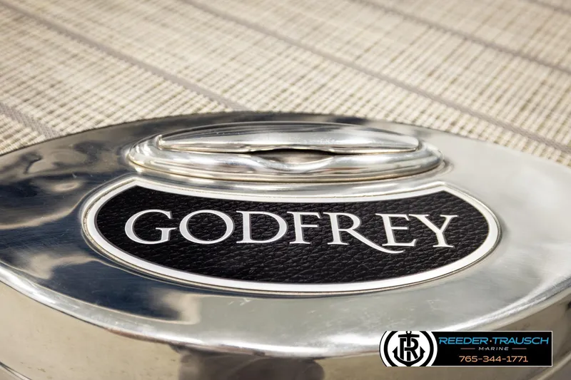 Slide: The Image of 2022 Godfrey Sweetwater 2286 emblem on a metallic surface. - 53