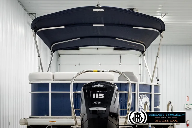 Slide: The Image of 2022 Godfrey Sweetwater 2286 pontoon boat with Mercury 115 engine in showroom. - 7
