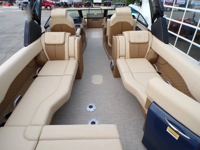 Slide: The Image of Luxurious interior of the 2026 Godfrey SanPan ULW pontoon boat. - 13