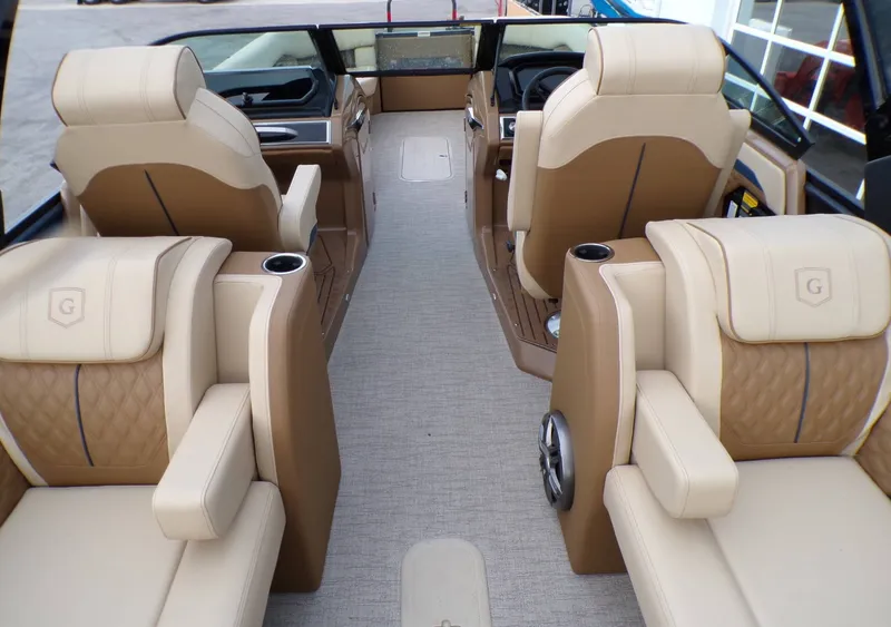 Slide: The Image of Luxurious interior of the 2026 Godfrey SanPan ULW pontoon boat. - 19