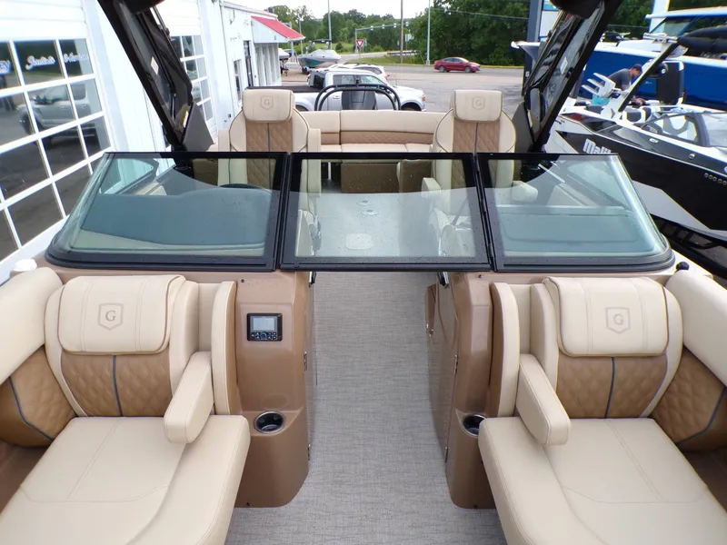 Slide: The Image of Interior view of 2026 Godfrey SanPan ULW with luxurious seating. - 22