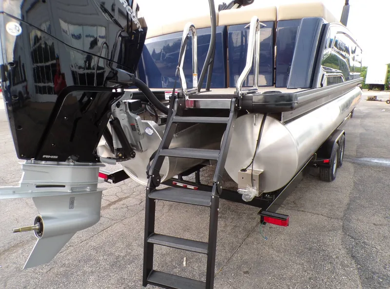 Slide: The Image of Rear view of 2026 Godfrey SanPan ULW pontoon boat with motor. - 7