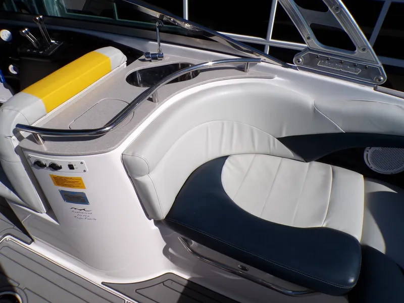 Slide: The Image of Interior of a 2005 MasterCraft X-80 boat with seating area. - 16