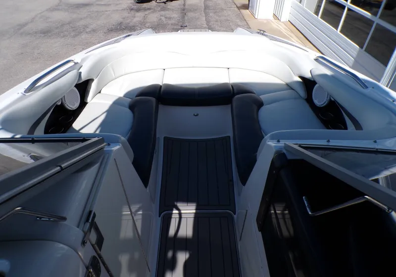 Slide: The Image of Interior of a 2005 MasterCraft X-80 boat with white seating. - 19