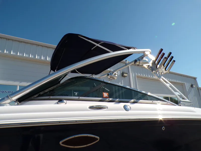 Slide: The Image of 2005 MasterCraft X-80 boat with sunshade and wakeboard rack. - 3