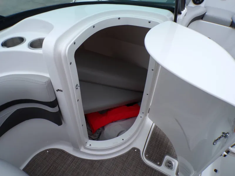 Slide: The Image of Interior of 2018 Hurricane 2400 SD with storage and seating area. - 16