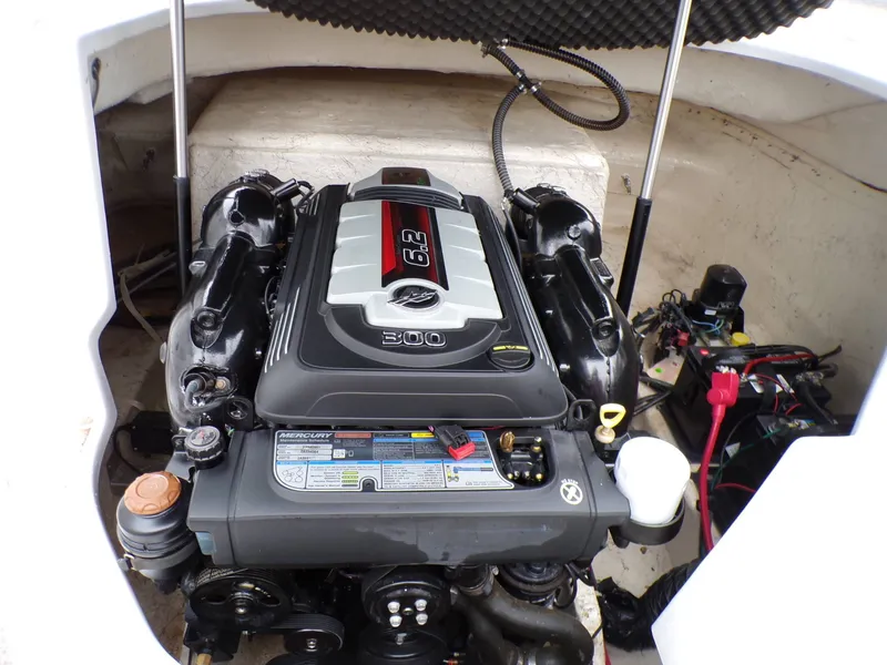 Slide: The Image of Engine compartment of a 2018 Hurricane 2400 SD boat. - 27
