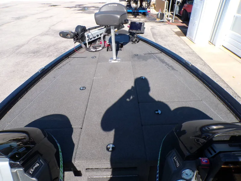 Slide: The Image of 2019 Lund 2075 Pro V Bass XS boat deck with equipment. - 10