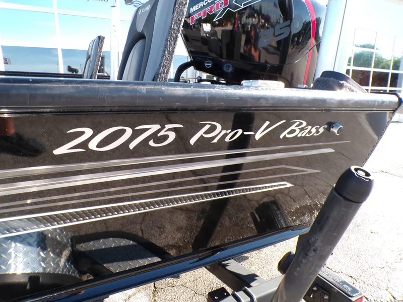 Slide: The Image of 2019 Lund 2075 Pro V Bass XS boat with Mercury engine. - 7