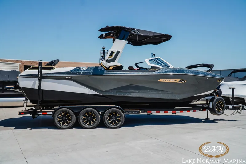 The Image of 2024 Nautique Super Air Nautique G25 Paragon boat on trailer at Lake Norman Marina. - 1