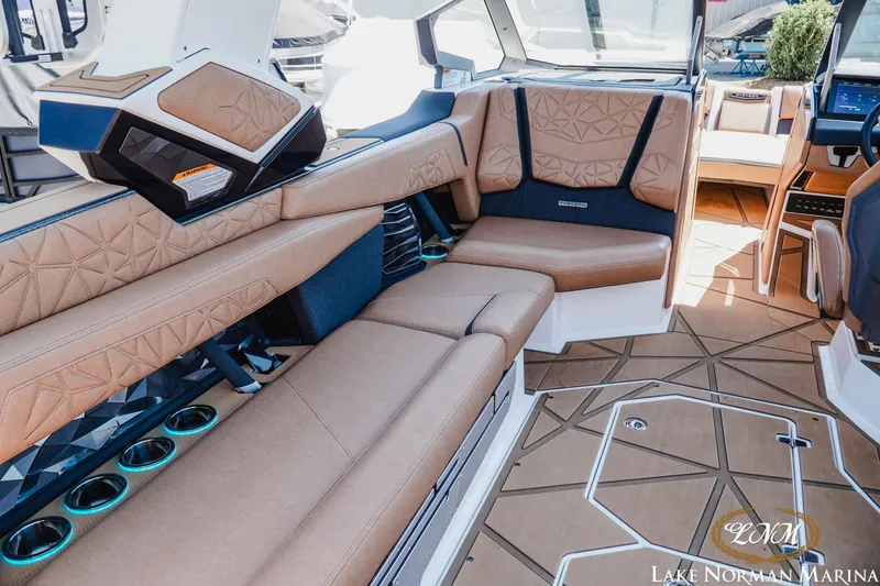 Slide: The Image of Luxurious interior of 2024 Nautique Super Air Nautique G25 Paragon with premium seating. - 15